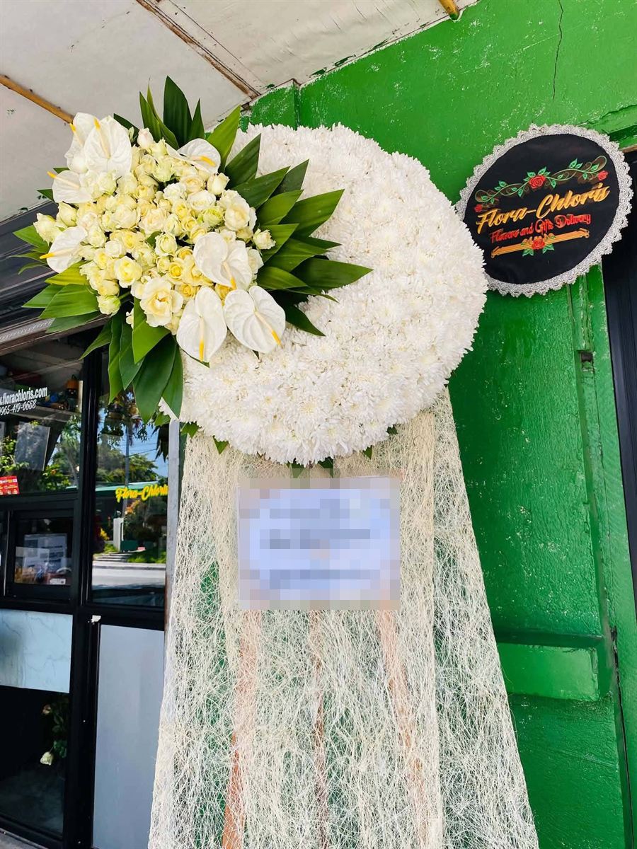 White standing funeral wreath with anthuriums and white roses – Flora Chloris General Santos City
